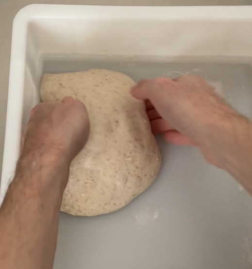2) Once dough is free from container border use your hands to move it to center of container (best leftover pizza dough ideas)