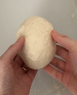 6) After rounding you have a regenerated pizza dough ball (best leftover pizza dough ideas)